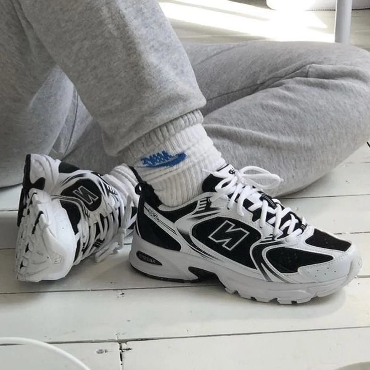 New Balance White & Black Sports Style Sneakers