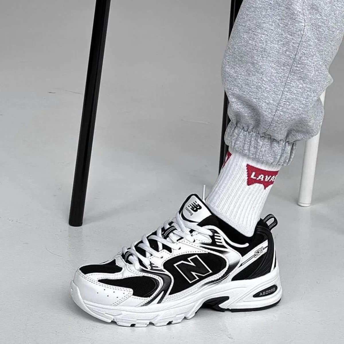 New Balance White & Black Sports Style Sneakers